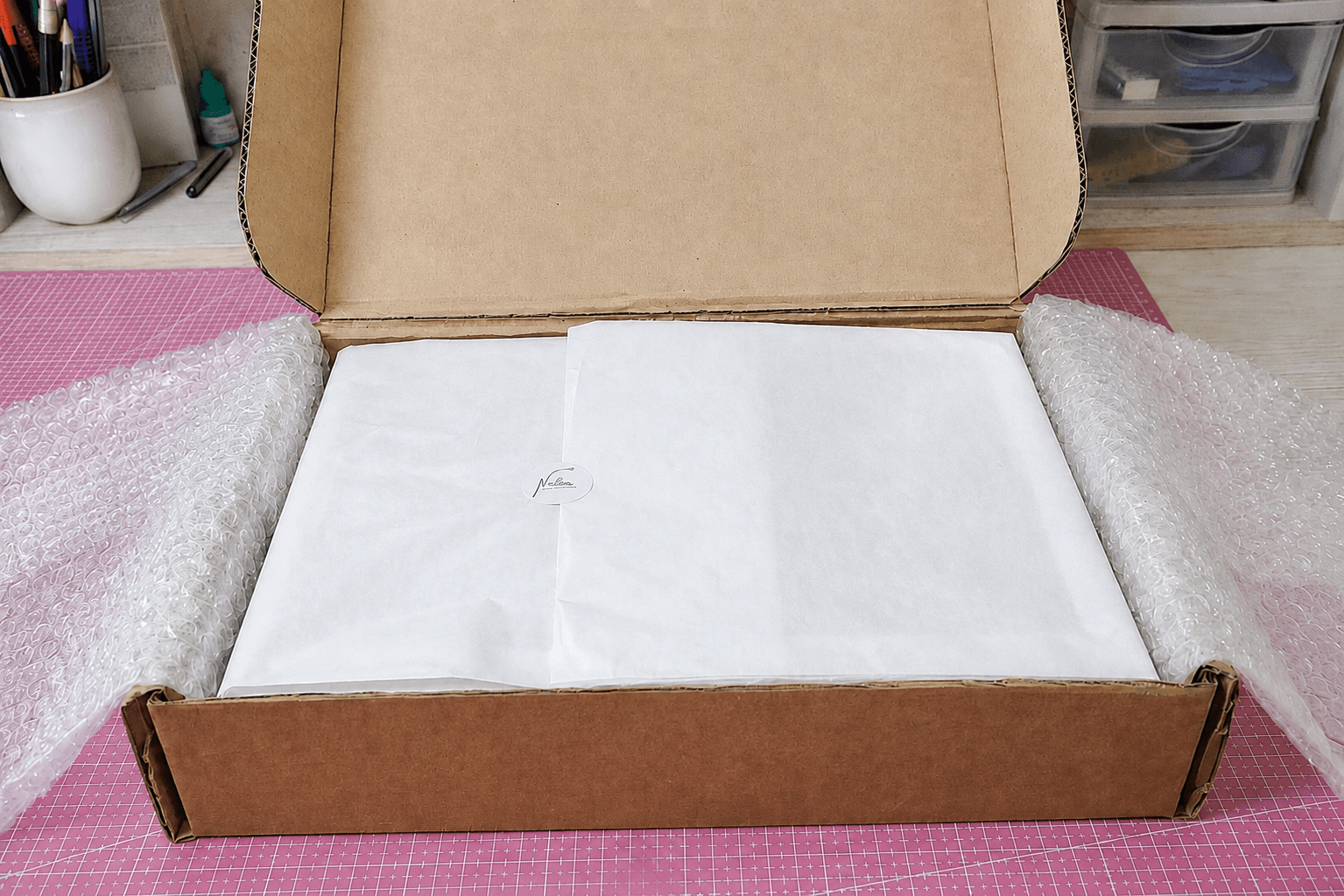 Protección: papel seda/papel burbuja